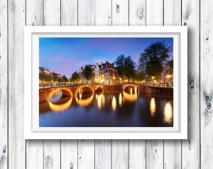 Amsterdam is beautiful at night. Taken on one of the many canals that run through the city.