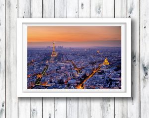 The sun sets over Paris from the top of the Montparnasse Tower. The Tower has 59 floors and has a spectacular 360 view of Paris from the top viewing deck. Perfect place for a glass of vino as the sun goes down.