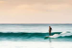 Surfing in the last light - Kirra