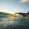 Sunlight coming through the waves at Burleigh Heads, Gold Coast.