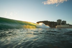 Sunlight coming through the waves at Burleigh Heads, Gold Coast.