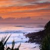 Surfer at sunrise - Burleigh Heads, Gold Coast.