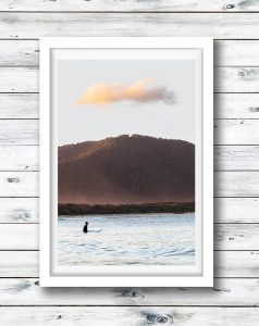 Surfing at sunset at Diamond Head, NSW.